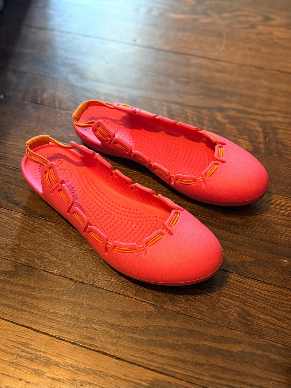 CROCS Coral Pink Slip-On Flats with Orange Trim